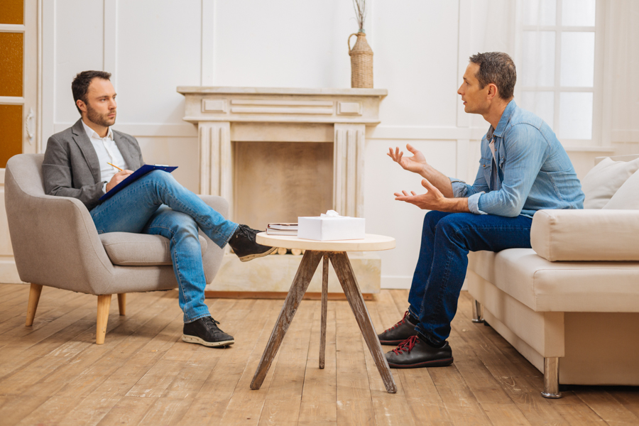Pensive psychologist conducting consultation