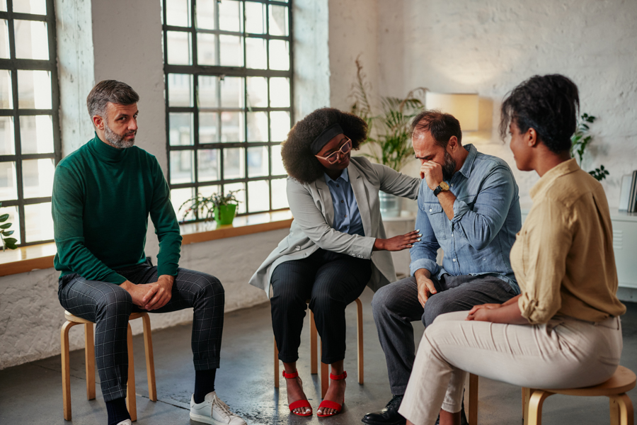 Multiracial therapy group during pandemic